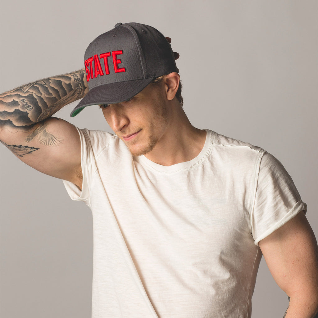 front view on model STATE Flat Bill Snapback Hat gray