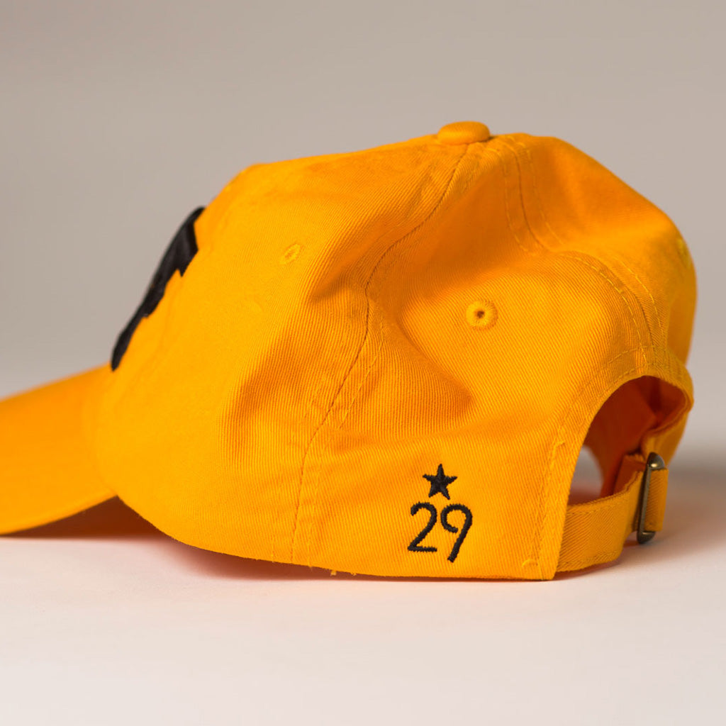 side view WAVE gold baseball hat