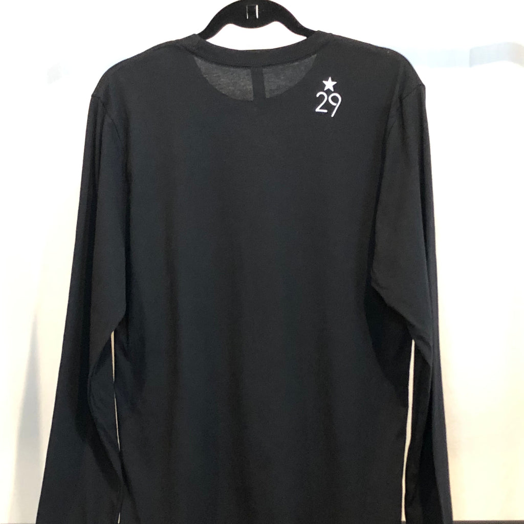 black long sleeve t-shirt on the hanger a view of the back with the 29th state apparel logo on the right shoulder